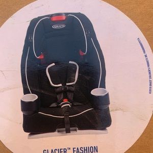 Toddler car seat with black color andGrace brand.